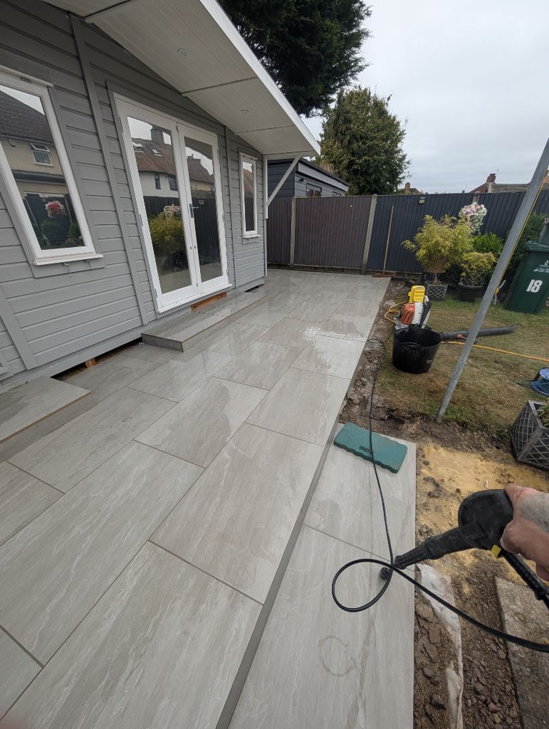 Large format patio slabs with garden office